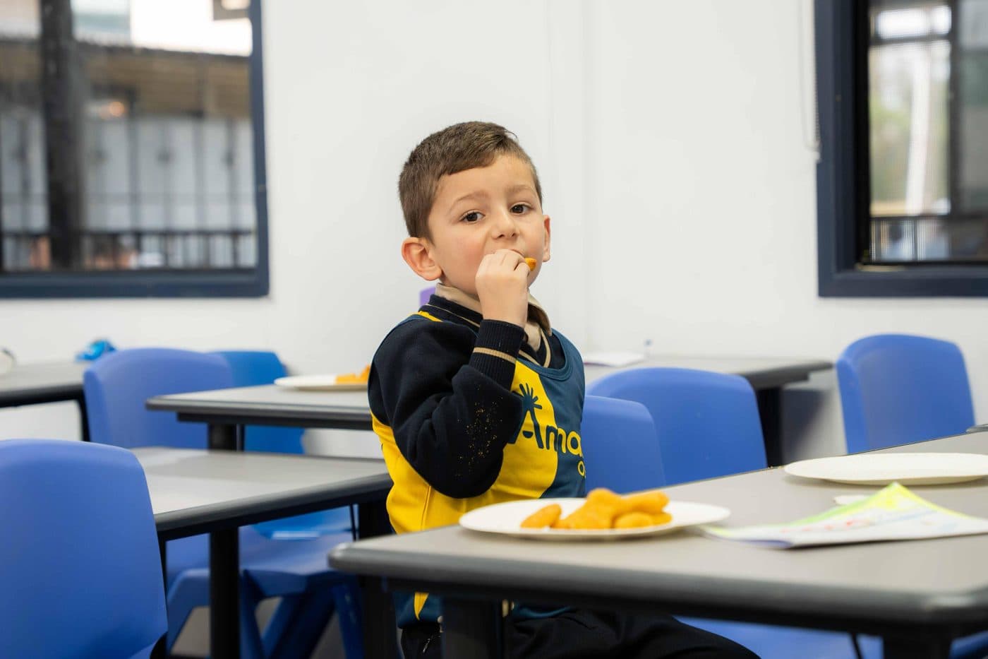 A child enjoying halal afternoon tea at Amana OSHC